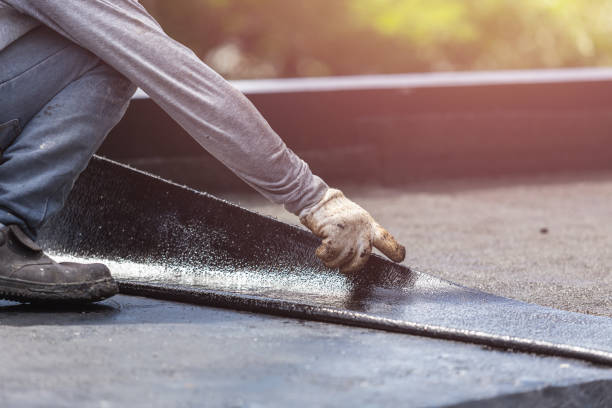 Professional Exterior Waterproofing technician working in Trenton, NJ